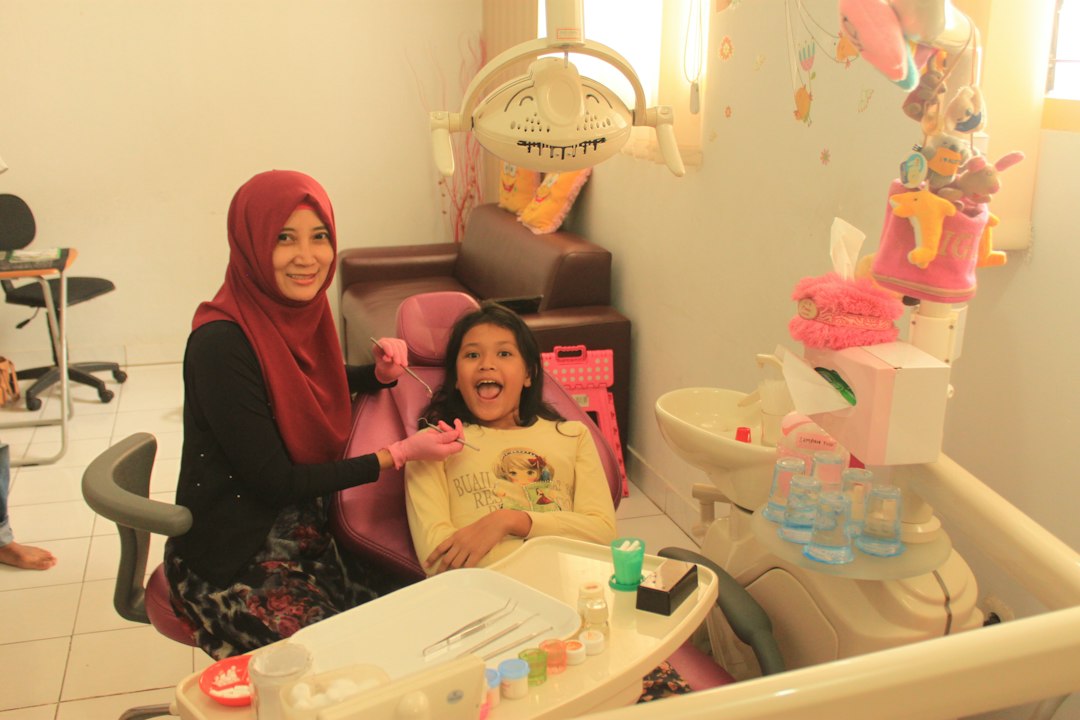 Child having a dental checkup in the dentist's chair